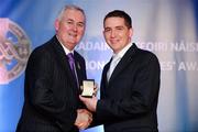 25 November 2011; Referee Colm Lyons, from Cork, is presented with his GAA All-Ireland U21 B Championship referees' award by Uachtarán CLG Criostóir Ó Cuana. 2011 National Referees' Awards Banquet, Croke Park, Dublin. Picture credit: Barry Cregg / SPORTSFILE