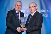 25 November 2011; Referee of the 1980 All-Ireland football final Seamus Murray, from Monaghan, is presented with his Hall of Fame award by Uachtarán CLG Criostóir Ó Cuana. 2011 National Referees' Awards Banquet, Croke Park, Dublin. Picture credit: Barry Cregg / SPORTSFILE