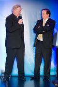 25 November 2011; Fr. Seamus Gardiner being interviewed on stage by Master of Ceremonies Marty Morrissey. 2011 National Referees' Awards Banquet, Croke Park, Dublin. Picture credit: Barry Cregg / SPORTSFILE