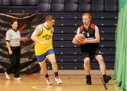 26 November 2011; Richard Maze, right, Antrim Borough, Co. Antrim, in action against Ciaran Rattigan, Navan Arch Club, Co. Meath. 2011 Special Olympics Ireland National Basketball Cup - Men, Antrim Borough v Navan Arch Club, National Basketball Arena, Tallaght, Dublin. Picture credit: Barry Cregg / SPORTSFILE