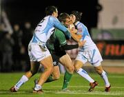 26 November 2011; Gavin Duffy, Connacht, is tackled by Ashley Beck and Matthew Morgan, right, Ospreys. Celtic League, Connacht v Ospreys, Sportsground, Galway. Picture credit: Pat Murphy / SPORTSFILE