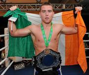 26 November 2011; Brian Brosnan, Galway, celebrates with his gold medal after his win against Stelyan Aveamidi, Kazakhstan, in their 71 kg full contact bout. 2011 WAKO World Kickboxing Championships, Citywest Conference Centre, Saggart, Dublin. Picture credit: Matt Browne / SPORTSFILE