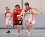 26 November 2011; Faye Boyd, Antrim Borough Special Olympics Club, in action against Fionnuala Clarke, COPE Foundation, Cork. 2011 Special Olympics Ireland National Basketball Cup - Women, Cope Foundation, Cork, v Antrim Borough Special Olympics Club, Corduff Sports Centre, Blanchardstown, Dublin. Picture credit: Stephen McCarthy / SPORTSFILE