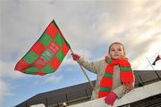 27 November 2011; Carnacon supporter Shauna McGing, age 4, and daughter of Carnacon player Michelle McGing, cheers on her team before the start of the game. Tesco All-Ireland Senior Ladies Football Club Championship Final, Carnacon v Na Fianna, Ballymahon, Co. Longford. Picture credit: David Maher / SPORTSFILE
