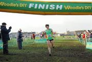 27 November 2011; Sarah Louise Treacy, Meath, crosses the finish line to win the senior women's race at the Woodie’s DIY Inter County Cross Country Championships. Sligo Racecourse, Sligo. Picture credit: Pat Murphy / SPORTSFILE