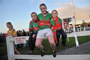 27 November 2011; Michelle McGing, Carnacon, with her son Conor, age 6, and daughter Shauna, age 4, celebrate after winning the Tesco All-Ireland Senior Ladies Football Club Championship Final. Tesco All-Ireland Senior Ladies Football Club Championship Final, Carnacon v Na Fianna, Ballymahon, Co. Longford. Picture credit: David Maher / SPORTSFILE
