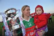 27 November 2011; Cora Staunton, Carnacon, celebrates with her niece Aoife Conroy, age 2, after winning the Tesco All-Ireland Senior Ladies Football Club Championship Final. Tesco All-Ireland Senior Ladies Football Club Championship Final, Carnacon v Na Fianna, Ballymahon, Co. Longford. Picture credit: David Maher / SPORTSFILE
