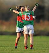 27 November 2011; Carnacon players Caroline McGing, left, and Natasha Beegan, celebrate at the end of the game after winning the Tesco All-Ireland Senior Ladies Football Club Championship Final. Tesco All-Ireland Senior Ladies Football Club Championship Final, Carnacon v Na Fianna, Ballymahon, Co. Longford. Picture credit: David Maher / SPORTSFILE