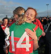 27 November 2011; Noelle Tierney, Carnacon, celebrates with team-mate Cora Staunton, 14, after winning the Tesco All-Ireland Senior Ladies Football Club Championship Final. Tesco All-Ireland Senior Ladies Football Club Championship Final, Carnacon v Na Fianna, Ballymahon, Co. Longford. Picture credit: David Maher / SPORTSFILE