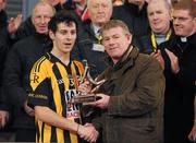27 November 2011; Jamie Clarke, Crossmaglen Rangers, receives the Man of the Match award from Seamus Doyle, AIB. AIB Ulster GAA Football Senior Club Championship Final, Crossmaglen Rangers v Burren St Mary's, Morgan Athletic Grounds, Armagh. Picture credit: Oliver McVeigh / SPORTSFILE