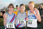 27 November 2011; Siofra Cleirigh Buttner, Dundrum South Dublin AC, winner of the Junior Women's race at the Woodie’s DIY Inter County Cross Country Championships, with second placed, Claire McCarthy, Dundrum South Dublin AC, left, and third placed Kate Veale, West Waterford AC, right. Sligo Racecourse, Sligo. Picture credit: Pat Murphy / SPORTSFILE