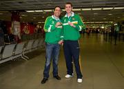 28 November 2011; Kenny Egan, left, and Con Sheehan on their arrival at Dublin airport following the Olympic Test Event at the ExCel in London where they both won Gold. Irish Team Return from Olympic Test Event Finals, Dublin Airport, Dublin. Picture credit: Barry Cregg / SPORTSFILE