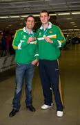 28 November 2011; Kenny Egan, left, and Con Sheehan on their arrival at Dublin airport following the Olympic Test Event at the ExCel in London where they both won Gold. Irish Team Return from Olympic Test Event Finals, Dublin Airport, Dublin. Picture credit: Barry Cregg / SPORTSFILE