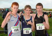 27 November 2011; Kirk Conall, Lagan Valley AC, winner of the boy's U16 race at the Woodie’s DIY Inter County Cross Country Championships with second placed Peter Gibbons, Letterkenny AC, Co. Donegal, right, and third placed Liam Fitzpatrick, Dundrum South Dublin AC, left. Sligo Racecourse, Sligo. Picture credit: Pat Murphy / SPORTSFILE