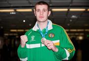 28 November 2011; Con Sheehan on his arrival at Dublin airport following the Olympic Test Event at the ExCel in London where he won Gold in the Super-Heavyweight category. Irish Team Return from Olympic Test Event Finals, Dublin Airport, Dublin. Picture credit: Barry Cregg / SPORTSFILE