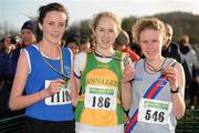 27 November 2011; Clodagh O'Reilly, Annalee AC, winner of the Girl's U16 race at the Woodie’s DIY Inter County Cross Country Championships with second placed Aisling Quinn, Waterford, left, and third placed Sarah Fitzpatrick, Dundrum South Dublin AC, right. Sligo Racecourse, Sligo. Picture credit: Pat Murphy / SPORTSFILE