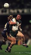 15 October 1999; Sean Og de Paor, Ireland, in action against Shane Crawford, Australia, International Compromise Rules Series, 2nd test, Melbourne. Picture credit; Ray McManus/SPORTSFILE