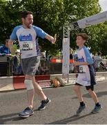 21 May 2017; Aidan and Matthew Nolan competing in the Streets of Dublin 5k race at the CHQ Building in North Wall, Dublin. Photo by Sam Barnes/Sportsfile