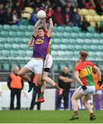 21 May 2017; David Gouldson of Wexford in action against Cathal O'Neill of Carlow during the Electric Ireland Leinster GAA Football Minor Championship Quarter Final match between Carlow and Wexford at Netwatch Cullen Park in Carlow. Photo by Ramsey Cardy/Sportsfile