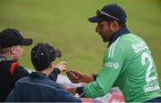 21 May 2017; Simi Singh of Ireland signs autographs during the One Day International match between Ireland and New Zealand at Malahide Cricket Club in Dublin. Photo by Cody Glenn/Sportsfile