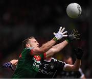 21 May 2017; Andy Moran of Mayo in action against Ross Donavan of Sligo during the Connacht GAA Football Senior Championship Quarter-Final match between Mayo and Sligo at Elvery's MacHale Park in Castlebar, Co Mayo. Photo by Stephen McCarthy/Sportsfile