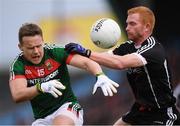 21 May 2017; Andy Moran of Mayo in action against Ross Donavan of Sligo during the Connacht GAA Football Senior Championship Quarter-Final match between Mayo and Sligo at Elvery's MacHale Park in Castlebar, Co Mayo. Photo by Stephen McCarthy/Sportsfile