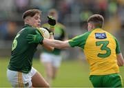 21 May 2017; Eoghan McCabe of Antrim  in action against Aaron Deeney of Donegal during the Electric Ireland Ulster GAA Football Minor Championship Quarter-Final match between Donegal and Antrim at MacCumhaill Park in Ballybofey, Co Donegal. Photo by Oliver McVeigh/Sportsfile