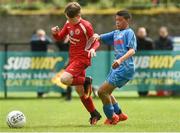 21 May 2017; Eric Cunningham  of Cork Schoolboys League in action against Pharrell Manual of  Dublin District Schoolboys League during the Subway SFAI U12 Final match between Cork Schoolboys League and Dublin District Schoolboys League in Cahir, Co Tipperary. Photo by David Maher/Sportsfile