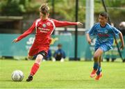 21 May 2017; Eric Cunningham  of Cork Schoolboys League in action against Pharrell Manual of  Dublin District Schoolboys League during the Subway SFAI U12 Final match between Cork Schoolboys League and Dublin District Schoolboys League in Cahir, Co Tipperary. Photo by David Maher/Sportsfile