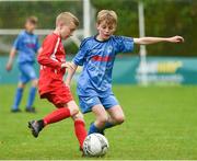21 May 2017; Charlie O'Brien of Cork Schoolboys League in action against James Crawford of  Dublin District Schoolboys League during the Subway SFAI U12 Final match between Cork Schoolboys League and Dublin District Schoolboys League in Cahir, Co Tipperary. Photo by David Maher/Sportsfile