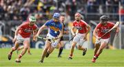 21 May 2017; John McGrath of Tipperary in action against Shane Kingston, left, and Colm Spillane of Cork during the Munster GAA Hurling Senior Championship Semi-Final match between Tipperary and Cork at Semple Stadium in Thurles, Co Tipperary. Photo by Ray McManus/Sportsfile