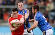 21 May 2017; Tommy Durnin of Louth in action against Paul McLoughlin and Stephen Kelly of Wicklow, right, during the Leinster GAA Football Senior Championship Round 1 match between Louth and Wicklow at Parnell Park in Dublin. Photo by Piaras Ó Mídheach/Sportsfile