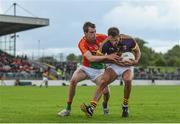 21 May 2017; Brian Malone of Wexford in action against Sean Gannon of Carlow during the Leinster GAA Football Senior Championship Round 1 match between Carlow and Wexford at Netwatch Cullen Park in Carlow. Photo by Ramsey Cardy/Sportsfile