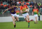 21 May 2017; Sean Murphy of Carlow in action against Joey Wadding of Wexford during the Leinster GAA Football Senior Championship Round 1 match between Carlow and Wexford at Netwatch Cullen Park in Carlow. Photo by Ramsey Cardy/Sportsfile