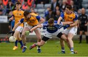 21 May 2017; Denis Booth of Laois in action against Larry Moran, left, and Liam Connerton of Longford during the Leinster GAA Football Senior Championship Round 1 match between Laois and Longford at O'Moore Park in Portlaoise, Co Laois. Photo by Daire Brennan/Sportsfile
