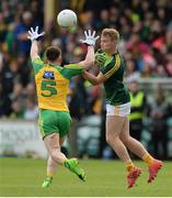 20 May 2017; Peter Healy of Antrim in action against Martin Reilly of Donegal during the Ulster GAA Football Senior Championship Quarter-Final match between Donegal and Antrim at MacCumhaill Park in Ballybofey, Co Donegal. Photo by Oliver McVeigh/Sportsfile