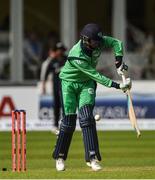 21 May 2017; George Dockrell of Ireland is hit by the ball for an IBW bowled by Adam Milne during the One Day International match between Ireland and New Zealand at Malahide Cricket Club in Dublin. Photo by Cody Glenn/Sportsfile