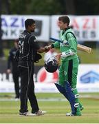 21 May 2017; Peter Chase of Ireland shakes hands with Ish Sodhi of New Zealand after being caught by Adam Milne of New Zealand for the last wicket of the match during the One Day International match between Ireland and New Zealand at Malahide Cricket Club in Dublin. Photo by Cody Glenn/Sportsfile