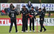 21 May 2017; Ish Sodhi, second from left, of New Zealand shakes hands with team-mate Scott Kuggeleijn after their win during the One Day International match between Ireland and New Zealand at Malahide Cricket Club in Dublin. Photo by Cody Glenn/Sportsfile