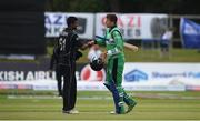 21 May 2017; Peter Chase of Ireland shakes hands with Ish Sodhi of New Zealand after being caught by Adam Milne of New Zealand for the last wicket of the match during the One Day International match between Ireland and New Zealand at Malahide Cricket Club in Dublin. Photo by Cody Glenn/Sportsfile