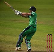 21 May 2017; Barry McCarthy of Ireland hits a boundary during the One Day International match between Ireland and New Zealand at Malahide Cricket Club in Dublin. Photo by Cody Glenn/Sportsfile