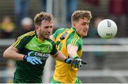 21 May 2017; Hugh McFadden of Donegal  in action against Patrick Gallagher of Antrim   during the Ulster GAA Football Senior Championship Quarter-Final match between Donegal and Antrim at MacCumhaill Park in Ballybofey, Co Donegal. Photo by Oliver McVeigh/Sportsfile