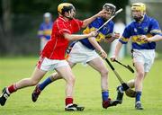 23 May 2006; Jerry McGrath, Cork, in action against Darren O'Meara and Eoin Gleeson, Tipperary. All-Ireland Vocational Schools Hurling Final Replay, Tipperary v Cork, Cashel, Co. Tipperary. Picture credit; John Kelly / SPORTSFILE