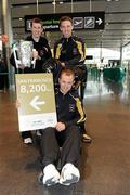 30 November 2011; Kilkenny hurlers Tommy Walsh, centre, Michael Rice, left, and Brian Hogan, prior to departure for San Francisco for the GAA GPA All-Stars Tour 2011 sponsored by Opel.  Dublin Airport, Dublin. Picture credit: Brian Lawless / SPORTSFILE