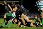 2 December 2011; Ethienne Reynecke, centre, Connacht, with support from team-mates George Naoupu, right, and John Muldoon, left, is tackled by Lorenzo Cittadini, Treviso. Celtic League, Connacht v Treviso, Sportsground, Galway. Picture credit: Barry Cregg / SPORTSFILE