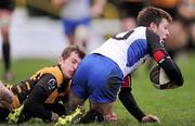 3 December 2011; Johnny Holland, Cork Constitution, is tackled by Matt Costello, Young Munster. Ulster Bank League, Division 1A, Cork Constitution v Young Munster, Temple Hill, Cork. Picture credit: Stephen McCarthy / SPORTSFILE