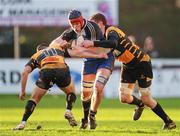 3 December 2011; Cathal O'Flaherty, Cork Constitution, is tackled by Darragh O'Neill, left, and Sean Duggan, Young Munster. Ulster Bank League, Division 1A, Cork Constitution v Young Munster, Temple Hill, Cork. Picture credit: Stephen McCarthy / SPORTSFILE