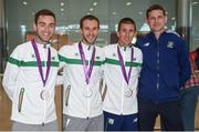 22 May 2017; Cian McManamon, Alex Wright and Robert Heffernan of the Ireland Men's Race Walking Team, who won bronze in the 20km at The European Race Walking Cup in Podebrady, Czech Republic, pictured on their return with Director of High Performance Paul McNamara, at Dublin Airport in Dublin. Photo by Seb Daly/Sportsfile
