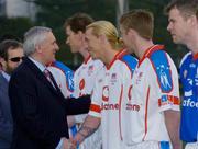 22 January 2005; An Taoiseach Bertie Ahern,T.D., is introduced to Ciaran McDonald, Mayo, before the start of the game. Exhibition Game, 2003 Vodafone All-Stars v 2004 Vodafone All-Stars, Hong Kong Football Club, Hong Kong, China. Picture credit; Ray McManus / SPORTSFILE