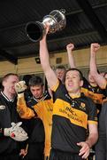 4 December 2011; Dr. Crokes captain Luke Quinn lifts the cup after victory over UCC. AIB Munster GAA Football Senior Club Championship Final, Dr. Crokes v UCC, Fitzgerald Stadium, Killarney, Co. Kerry. Picture credit: Diarmuid Greene / SPORTSFILE